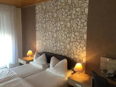 Ein Bett oder Betten in einem Zimmer der Unterkunft Hotel Restaurant Alexandros