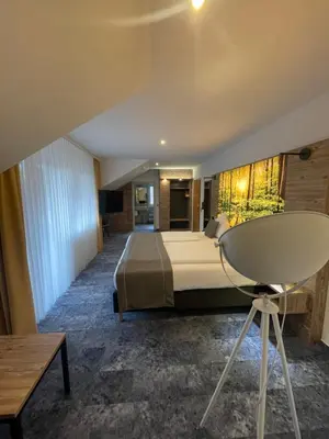 Ein Bett oder Betten in einem Zimmer der Unterkunft Hotel Christel