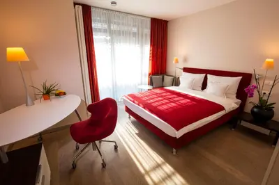 Ein Bett oder Betten in einem Zimmer der Unterkunft Maurers Zollamt Hotel