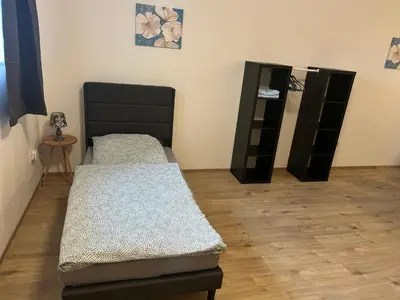 Ein Bett oder Betten in einem Zimmer der Unterkunft Haus Elbert Eschau