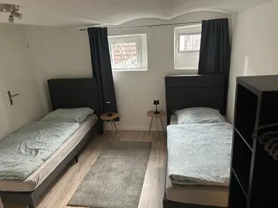 Ein Bett oder Betten in einem Zimmer der Unterkunft Haus Elbert Eschau