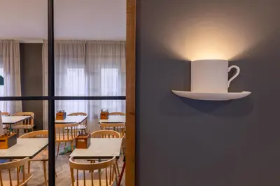 Ein Restaurant oder anderes Speiselokal in der Unterkunft Garner Hotel Mannheim City by IHG