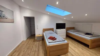 Ein Bett oder Betten in einem Zimmer der Unterkunft Ferienwohnung/Monteurwohnung im schönen Odenwald