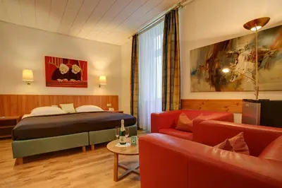 Ein Bett oder Betten in einem Zimmer der Unterkunft Trip Inn Hotel Blankenburg