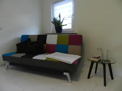 Ein Sitzbereich in der Unterkunft Ferienwohnung Burgenblilck