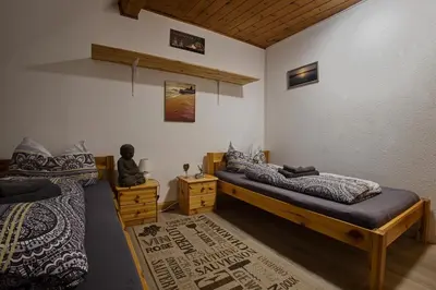 Ein Bett oder Betten in einem Zimmer der Unterkunft Haus Rheinsheimer Scheuer