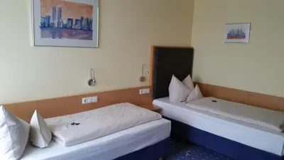 Ein Bett oder Betten in einem Zimmer der Unterkunft Hotel Ifen