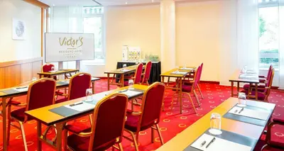 Ein Restaurant oder anderes Speiselokal in der Unterkunft Victor's Residenz-Hotel Frankenthal