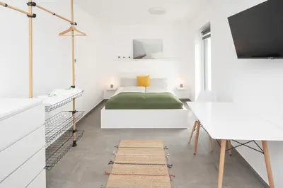 Ein Bett oder Betten in einem Zimmer der Unterkunft Nibelungen Apartments