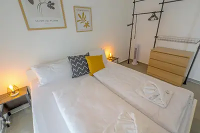 Ein Bett oder Betten in einem Zimmer der Unterkunft Nibelungen Apartments