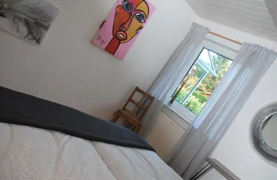 Ein Bett oder Betten in einem Zimmer der Unterkunft Gartenhaus am Weinberg