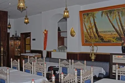Ein Restaurant oder anderes Speiselokal in der Unterkunft Hotel Starkenburger Hof