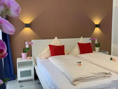 Ein Bett oder Betten in einem Zimmer der Unterkunft Hotel B54 Heidelberg City