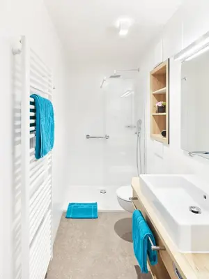 Ein Badezimmer in der Unterkunft Gästehaus Bauer - Schlafen auf dem Weingut