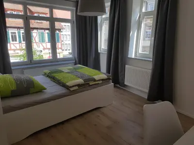 Ein Bett oder Betten in einem Zimmer der Unterkunft Ferienwohnung