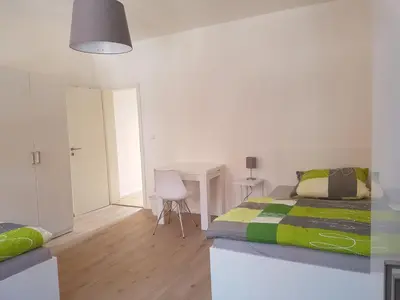 Ein Bett oder Betten in einem Zimmer der Unterkunft Ferienwohnung
