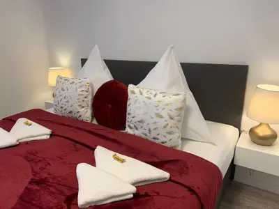 Ein Bett oder Betten in einem Zimmer der Unterkunft Prime Host Charme Apartment