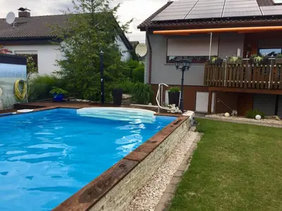 Der Swimmingpool an oder in der Nähe von Ferienwohnung Schwarz