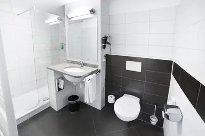 Ein Badezimmer in der Unterkunft Hotel Krone
