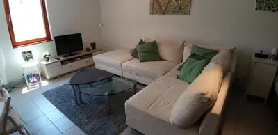 Ein Sitzbereich in der Unterkunft Ferienwohnung Am Backhausgarten