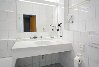 Ein Badezimmer in der Unterkunft Hotel Bessunger Forst