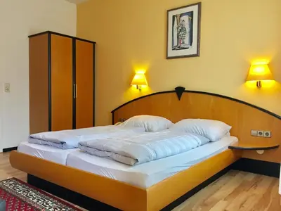 Ein Bett oder Betten in einem Zimmer der Unterkunft Hotel Kull von Schmidsfelden