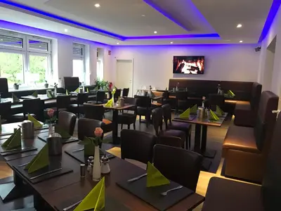 Ein Sitzbereich in der Unterkunft Wincent Hotel GmbH