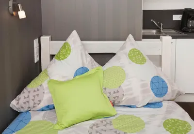 Ein Bett oder Betten in einem Zimmer der Unterkunft Pension SiLa
