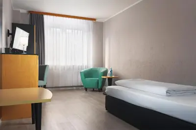 Ein Bett oder Betten in einem Zimmer der Unterkunft Trip Inn Hotel Egelsbach Frankfurt