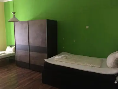 Ein Bett oder Betten in einem Zimmer der Unterkunft WOHNUNG IN KAISERSLAUTERN