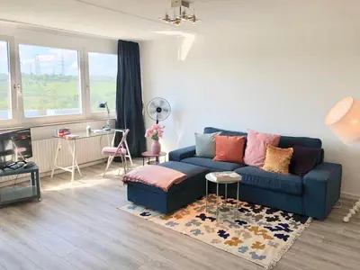 Ein Sitzbereich in der Unterkunft großes Appartement mit Aussichtsbalkon