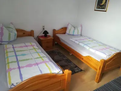 Ein Bett oder Betten in einem Zimmer der Unterkunft Brauhaus Fröschl