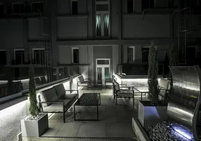 Ein Sitzbereich in der Unterkunft Hotel Royal