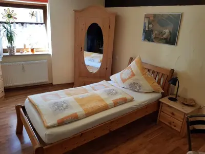 Ein Bett oder Betten in einem Zimmer der Unterkunft Zum Burgtörle
