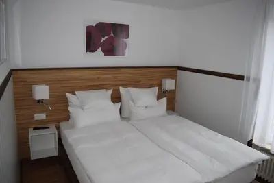 Ein Bett oder Betten in einem Zimmer der Unterkunft Apartments mit Klimaanlage am Neckarufer, Schöne Aussicht