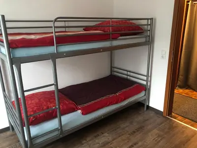 Ein Bett oder Betten in einem Zimmer der Unterkunft Ferienwohnung Janson-2