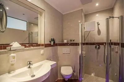 Ein Badezimmer in der Unterkunft Hotel Mack Private Inn