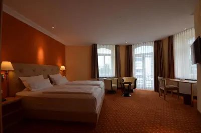 Ein Bett oder Betten in einem Zimmer der Unterkunft Hotel Mack Private Inn