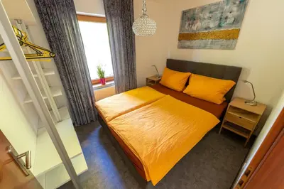 Ein Bett oder Betten in einem Zimmer der Unterkunft Brands Appartement
