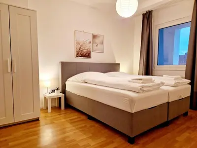 Ein Bett oder Betten in einem Zimmer der Unterkunft Hofgarten Apartments