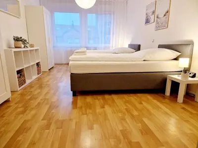 Ein Bett oder Betten in einem Zimmer der Unterkunft Hofgarten Apartments