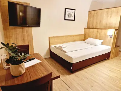Ein Bett oder Betten in einem Zimmer der Unterkunft Hofgarten Apartments