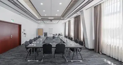 Der Geschäftsbereich oder Konferenzraum in der Unterkunft PLAZA Premium Darmstadt