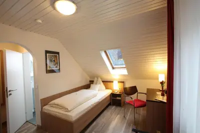 Ein Bett oder Betten in einem Zimmer der Unterkunft Kloster Schöntal