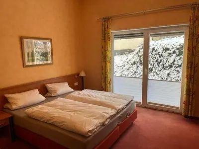 Ein Bett oder Betten in einem Zimmer der Unterkunft Landhotel Ritter-Post
