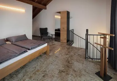 Ein Bett oder Betten in einem Zimmer der Unterkunft Ferienhaus Alte Glaserei