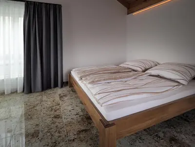 Ein Bett oder Betten in einem Zimmer der Unterkunft Ferienhaus Alte Glaserei