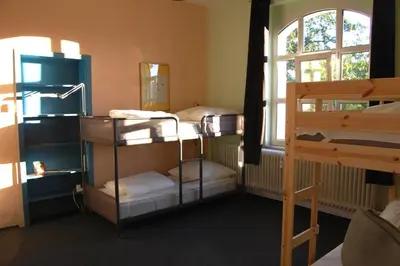Ein Bett oder Betten in einem Zimmer der Unterkunft Oberzent-Hostelstyle nur für aktive Touristen