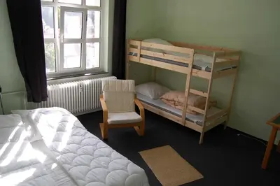 Ein Bett oder Betten in einem Zimmer der Unterkunft Oberzent-Hostelstyle nur für aktive Touristen