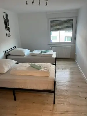 Ein Bett oder Betten in einem Zimmer der Unterkunft Monteurwohnung Pforzheim Zentrum